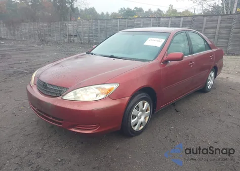 2002 Toyota Camry Le from USA, damaged, VIN 4T1BE32K02U558576